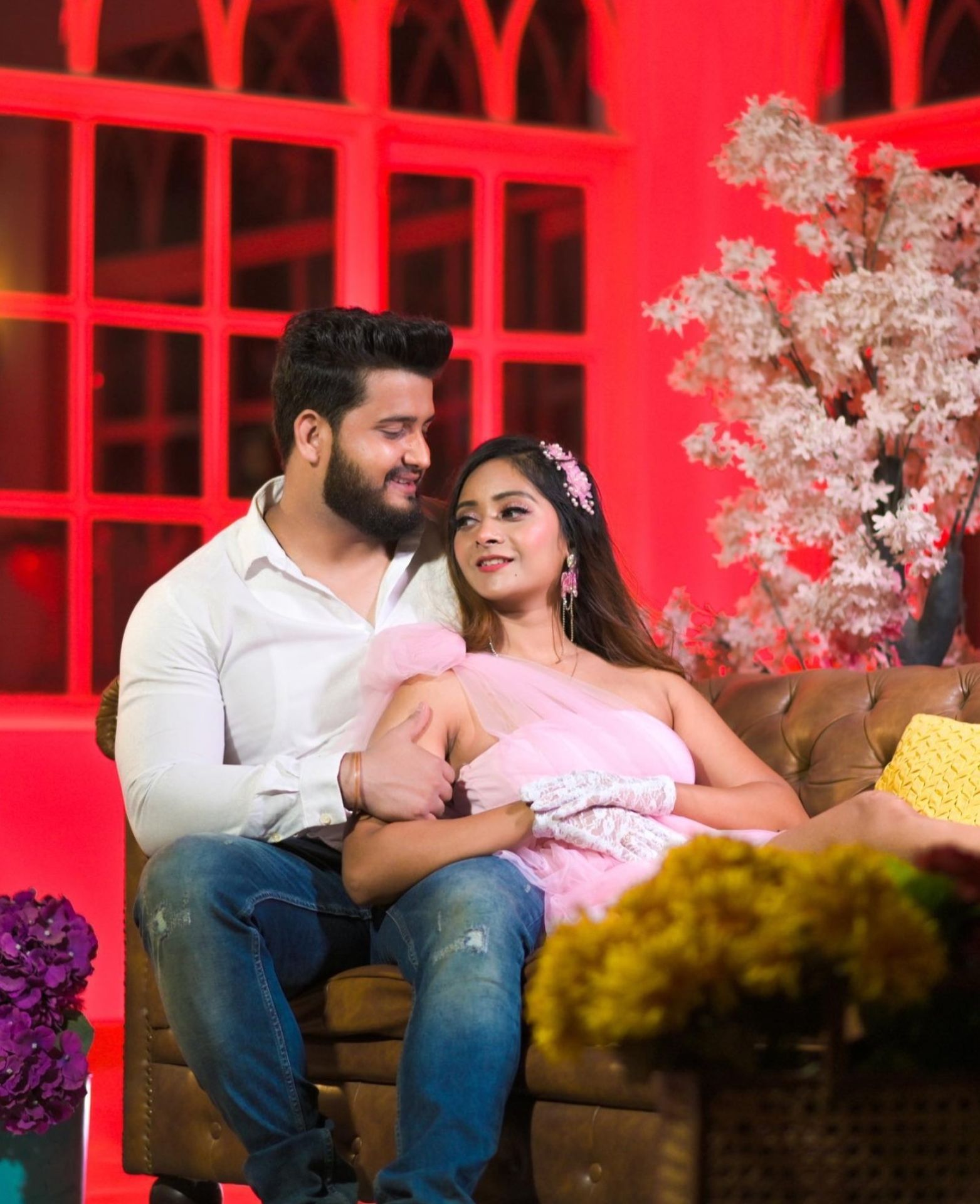Romantic couple portrait with red themed background by Bright Luxe Salon &amp; Studio, Mahendergarh