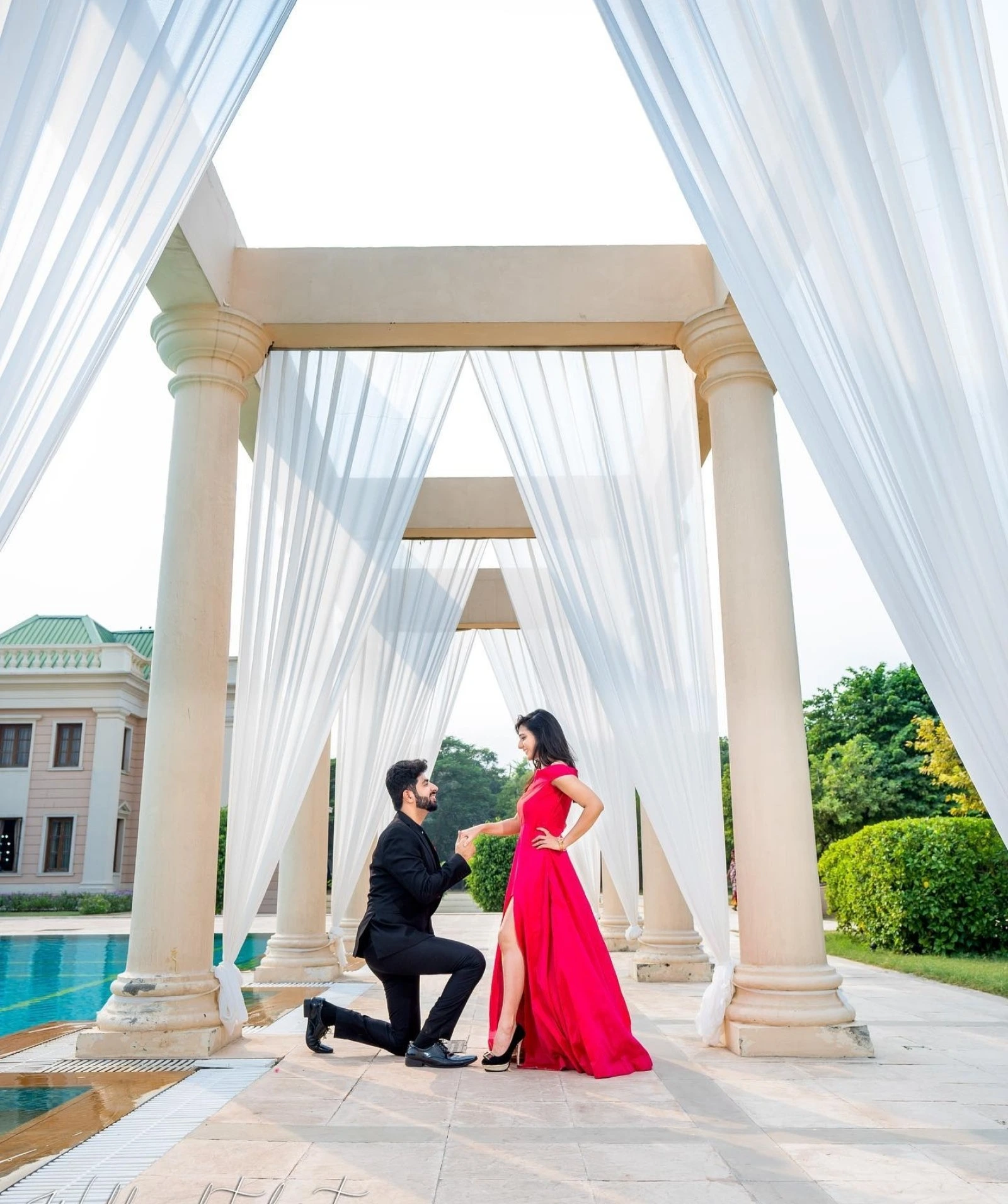 Wedding couple entry portrait under mandap by Bright Luxe Salon &amp; Studio, Mahendergarh