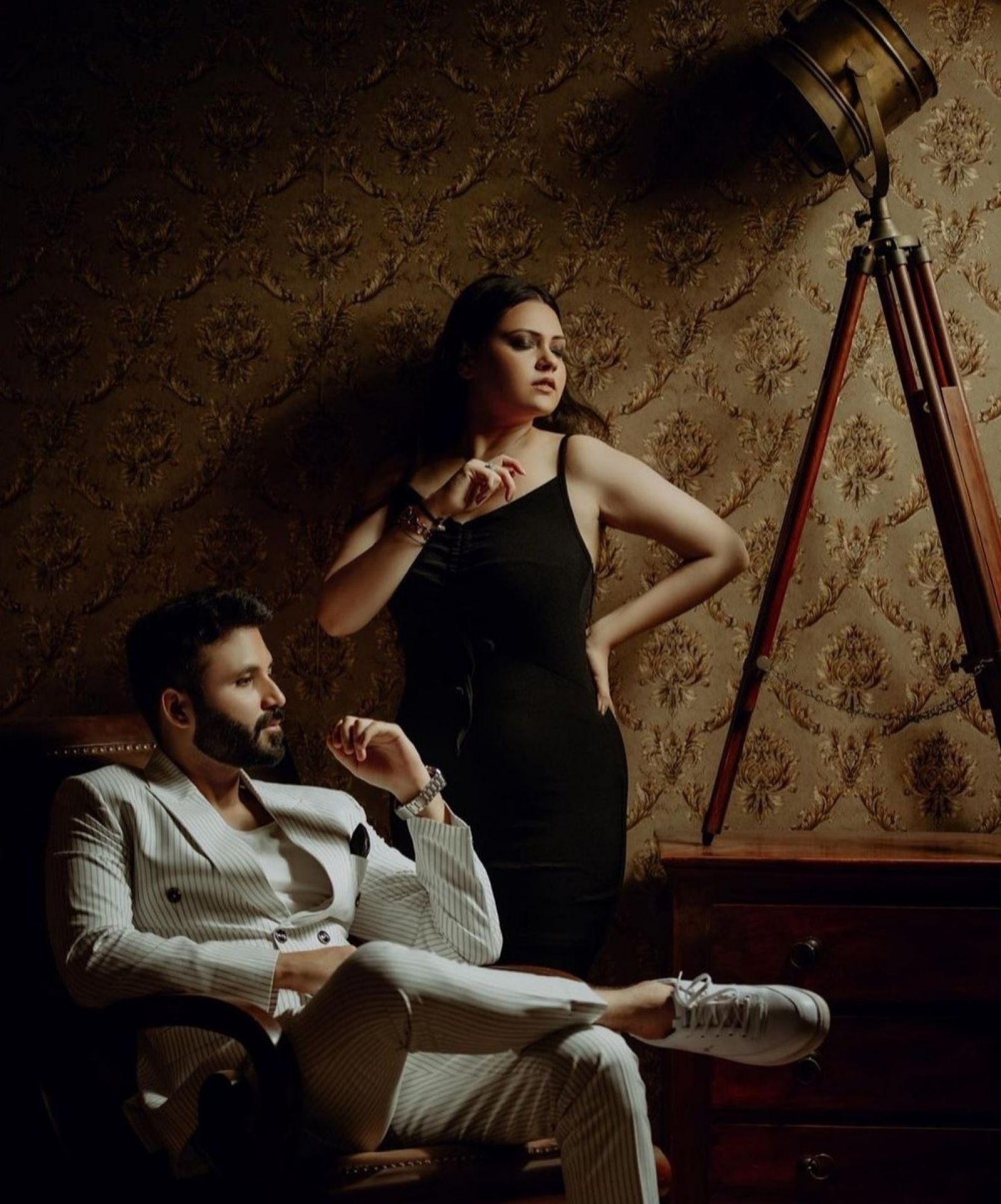 Artistic low-light couple portrait by Bright Luxe Salon &amp; Studio, Mahendergarh