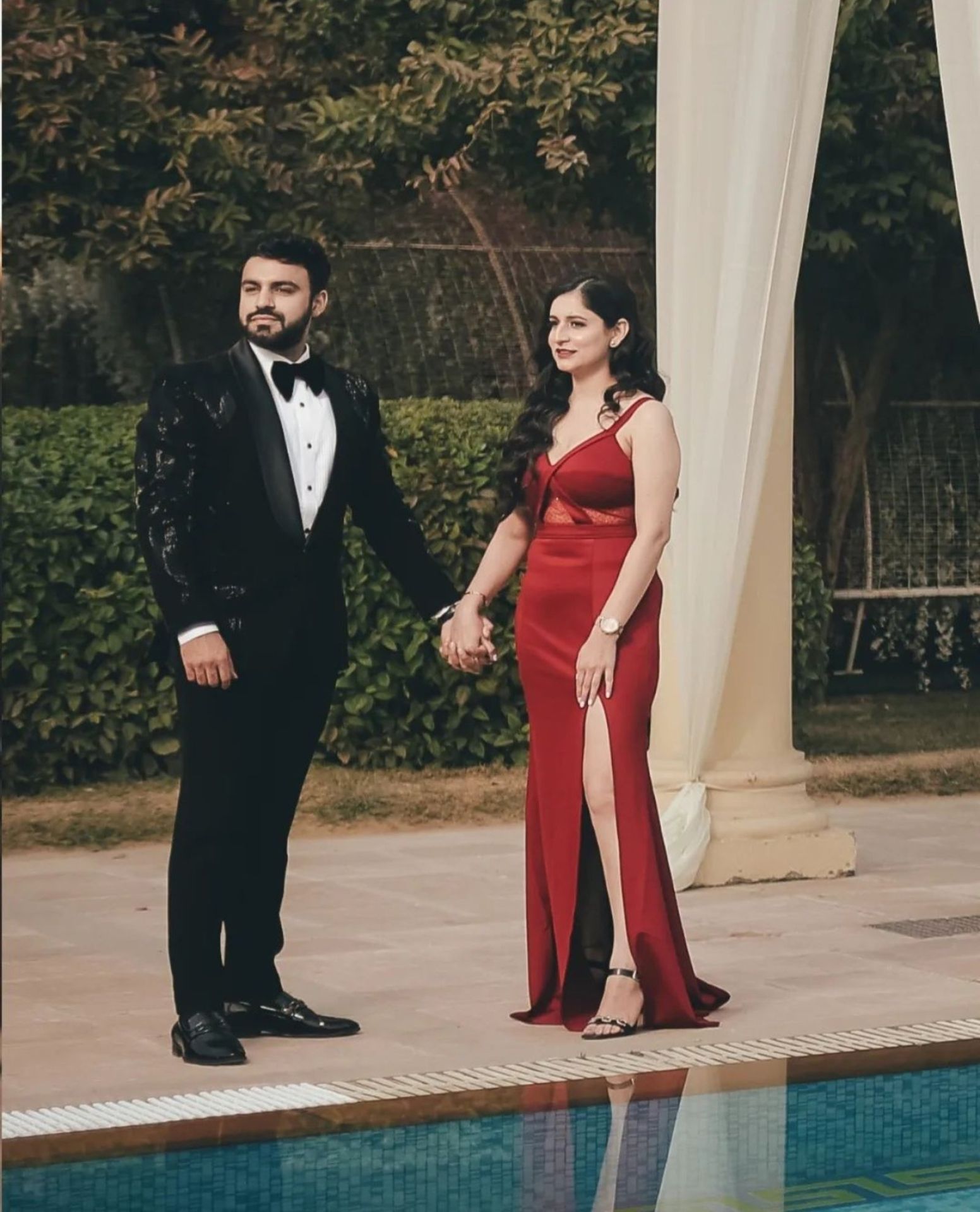 Elegant evening couple portrait in formal attire by Bright Luxe Salon &amp; Studio, Mahendergarh