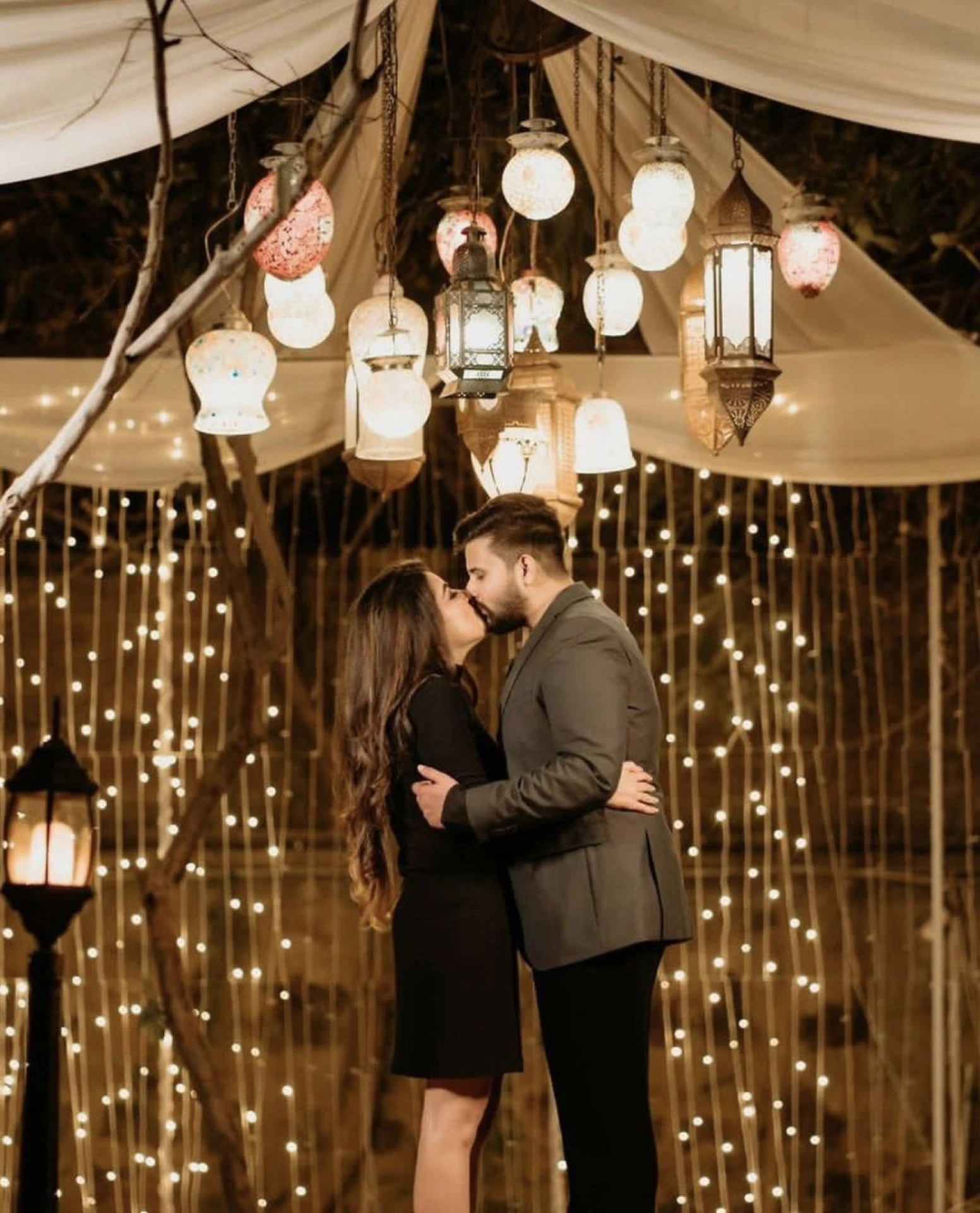 Romantic couple portrait under warm lights by Bright Luxe Salon &amp; Studio, Mahendergarh