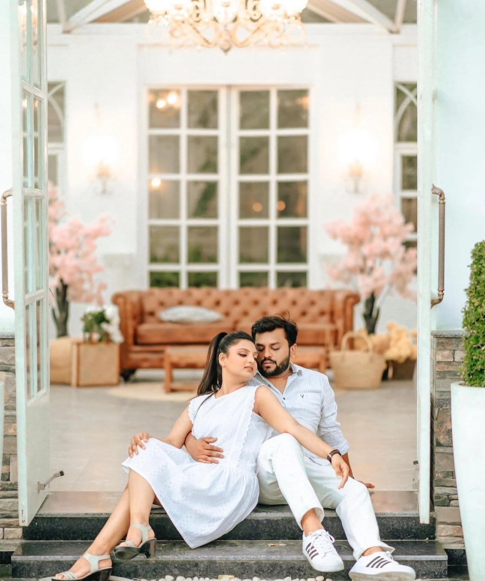 Elegant pre-wedding couple portrait on balcony by Bright Luxe Salon &amp; Studio, Mahendergarh