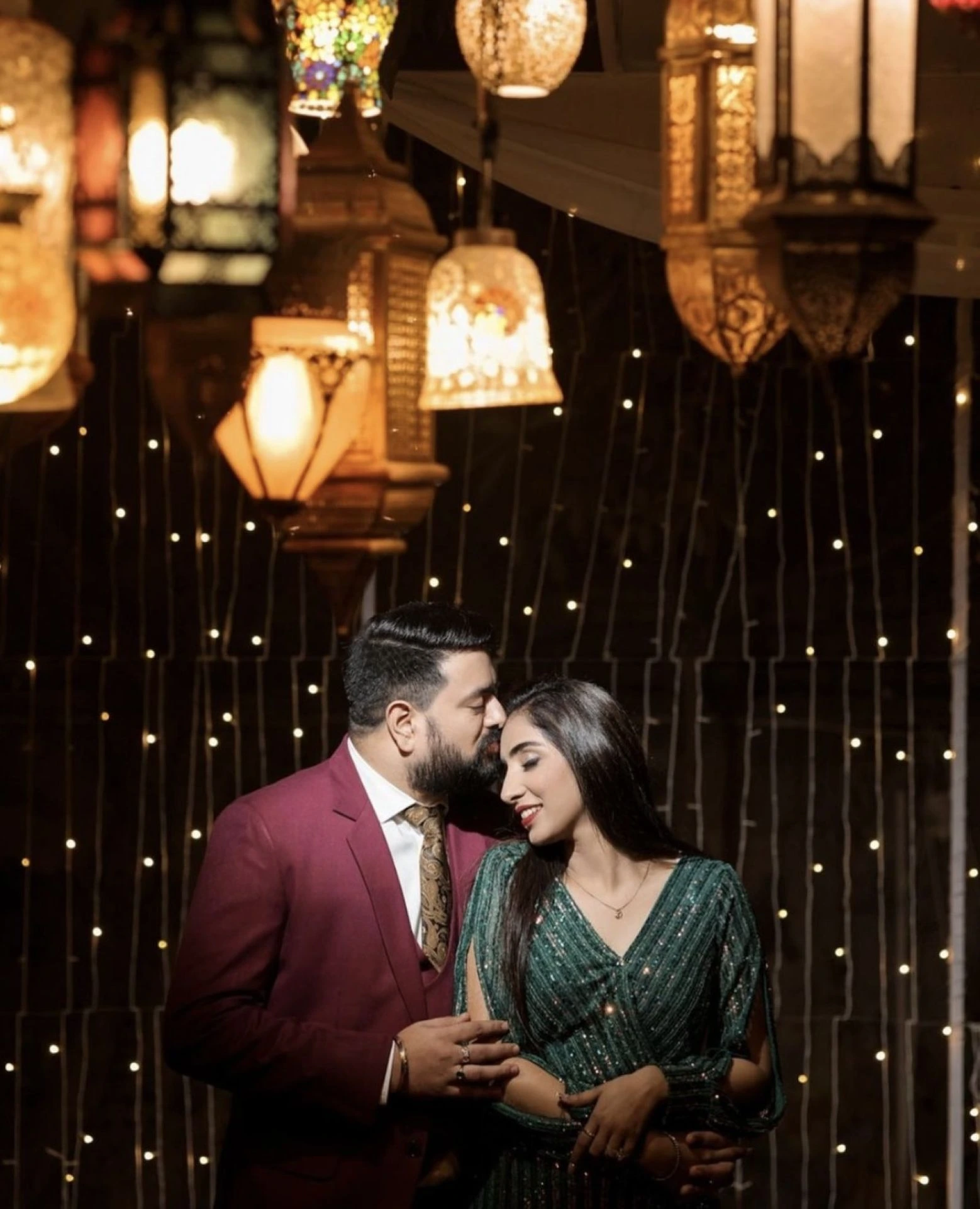 Intimate indoor couple photography with warm lights by Bright Luxe Salon &amp; Studio, Mahendergarh