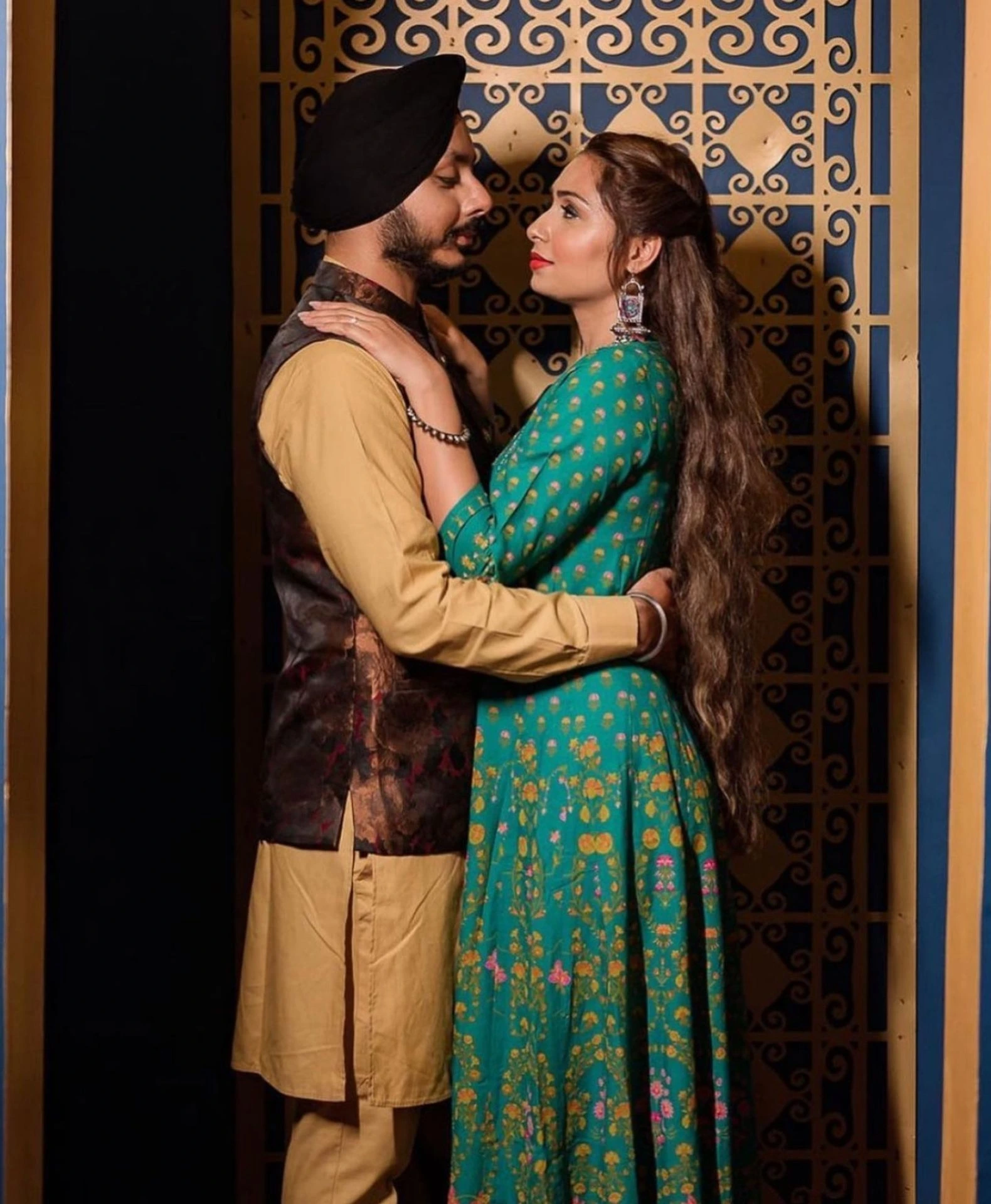 Romantic pre-wedding couple portrait in ethnic attire by Bright Luxe Salon &amp; Studio, Mahendergarh