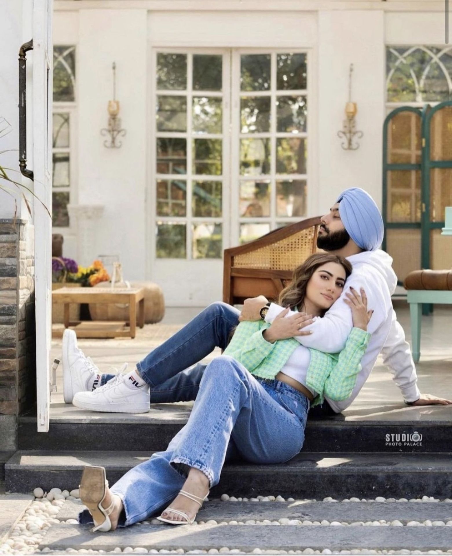 Modern pre-wedding couple sitting portrait by Bright Luxe Salon &amp; Studio, Mahendergarh